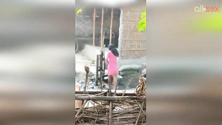 Guy can't take eyes off hot Desi MILF in slinky red dress washing | XXX Video on AllSex.XXX