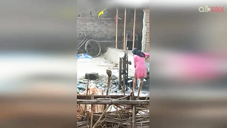 Guy can't take eyes off hot Desi MILF in slinky red dress washing | XXX Video on AllSex.XXX