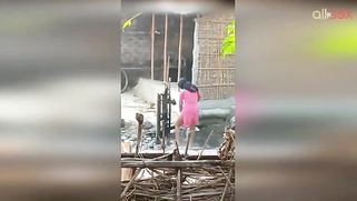 Guy can't take eyes off hot Desi MILF in slinky red dress washing | XXX Video on AllSex.XXX