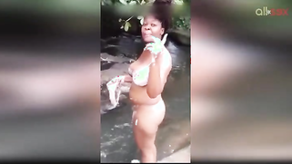 Lewd amateur Desi aunty flashing her nice big tits while bathing outdoor | XXX Video on AllSex.XXX