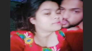 Desi girl in red sari kisses bearded man who films their lips merging | XXX Video on AllSex.XXX