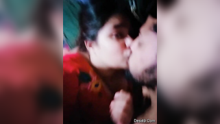 Desi girl in red sari kisses bearded man who films their lips merging | XXX Video on AllSex.XXX