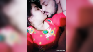 Desi girl in red sari kisses bearded man who films their lips merging | XXX Video on AllSex.XXX