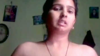 Hot Desi teen shows off titties and touches the shaved twat close-up
