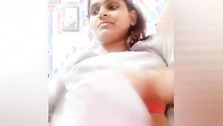 Young woman smiles on camera and changes clothes in sex video show | XXX Video on AllSex.XXX