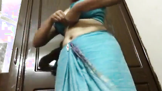 Desi housewife takes off blue dress to brag about her porn treasures | XXX Video on AllSex.XXX