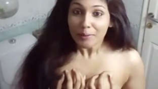Bathroom porn video of the long-haired Desi with saggy boobies | XXX Video on AllSex.XXX
