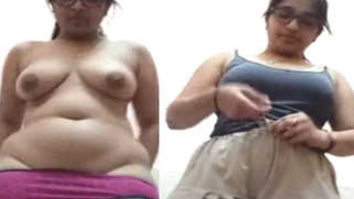 Desi porn girl with glasses dances and pisses in an empty bottle | XXX Video on AllSex.XXX