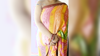 Woman in a colored dress teases Desi guys revealing big breast