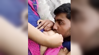 Youngster can't stop worshipping juicy Desi tits in the porn video