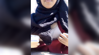 Desi woman with pink lips touches tits in the outdoor porn video