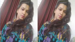 Desi girl in floral shirt kisses porn partner being covered with a smile