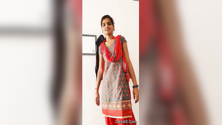 Clothed Desi sweetie is going to pamper men with a porn video soon