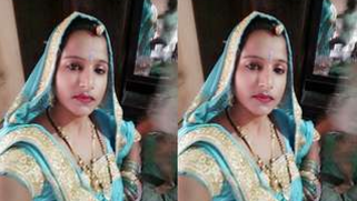 Amateur Desi slut puts off red bra and shows big XXX tits for cam