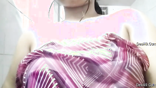 Nude Desi sweetie puts on lotion and plays with tits for XXX video | XXX Video on AllSex.XXX