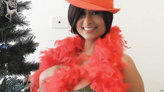 Busty Desi MILF in red XXX teases with her curves in X-mas video | XXX Video on AllSex.XXX