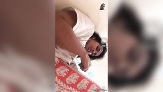 Girl performs XXX show and pulls up white T-shirt to expose boobs | XXX Video on AllSex.XXX