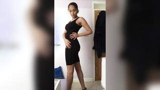 Indian woman with sexy body wears black dress that makes her look hot