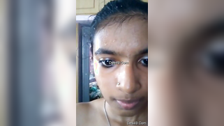 Indian teen with big eyes and pierced nostril shows what she has got