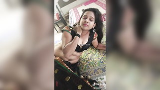 Desi mom doesn't open top but tits look amazing even being hidden