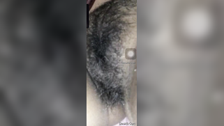 Amateur XXX video of Indian who slowly stimulates her hairy clitoris