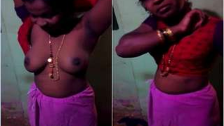 Indian aunty puts red top on hiding saggy titties in amateur XXX video | XXX Video on AllSex.XXX