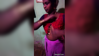 Indian aunty puts red top on hiding saggy titties in amateur XXX video | XXX Video on AllSex.XXX