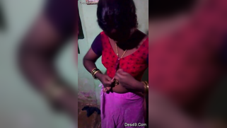 Indian aunty puts red top on hiding saggy titties in amateur XXX video | XXX Video on AllSex.XXX