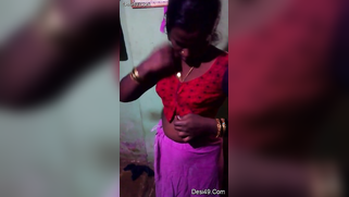 Indian aunty puts red top on hiding saggy titties in amateur XXX video | XXX Video on AllSex.XXX