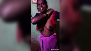 Indian aunty puts red top on hiding saggy titties in amateur XXX video | XXX Video on AllSex.XXX