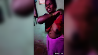 Indian aunty puts red top on hiding saggy titties in amateur XXX video | XXX Video on AllSex.XXX