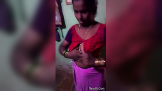 Indian aunty puts red top on hiding saggy titties in amateur XXX video | XXX Video on AllSex.XXX