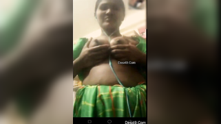 Desi chick takes saggy breasts to light so that boyfriend can jerk off