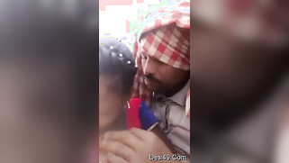 Bearded man kisses Desi coed and plays with sensitive tits outdoors