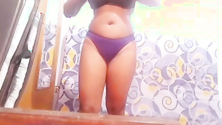 Desi possessor of appetizing twins takes everything off on camera