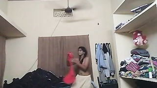 Indian girl wears pink bra and red top on camera in her bedroom | XXX Video on AllSex.XXX
