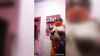 Busty Desi mom takes clothes off to expose her smokin' hot body | XXX Video on AllSex.XXX