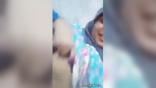 Indian aunty in hijab shows boobs and stimulates her pink hole