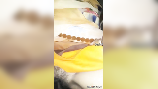 Indian babe lifts yellow sari and shows off pretty hairy pussy | XXX Video on AllSex.XXX