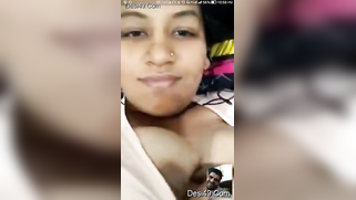 Cute and open-minded Indian strips natural jugs with perky nipples