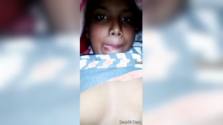 Desi girl pulls T-shirt up and exposes small boobs with big nipples