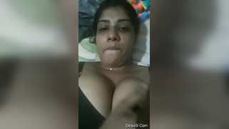 Indian aunty with sexy full lips takes big natural boobs out in bed | XXX Video on AllSex.XXX