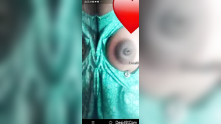 Desi mom in green sari gets partially naked in bed exposing breasts | XXX Video on AllSex.XXX