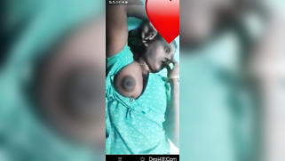 Desi mom in green sari gets partially naked in bed exposing breasts