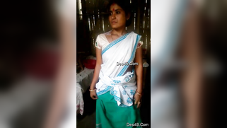 Indian aunty obeys young man behind camera and shows her hairy peach