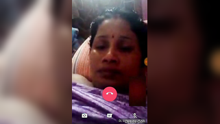 Awesome Indian aunty temptingly lies in bed and plays with knockers