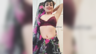 Indian mom in carnival sari moves body and slowly strips down on cam | XXX Video on AllSex.XXX