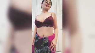 Indian mom in carnival sari moves body and slowly strips down on cam | XXX Video on AllSex.XXX