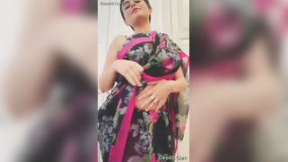 Indian mom in carnival sari moves body and slowly strips down on cam | XXX Video on AllSex.XXX