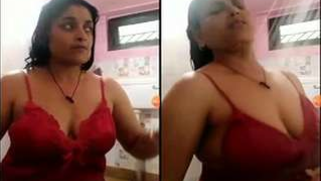 Desi aunty does crazy things like showering in red gown in XXX clip | XXX Video on AllSex.XXX